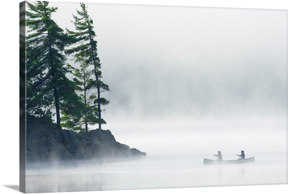 Canoeing Through Fog On Lake Of Two Rivers, Ontario, Canada
