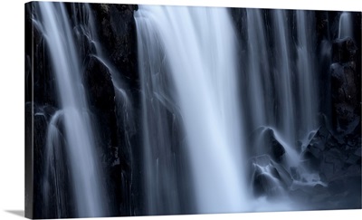 Close-Up Of A Series Of Waterfalls, Soft Blur Of Flowing Water Over Black Rock, Iceland