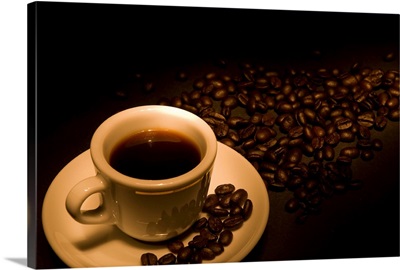 Coffee Beans And Fresh Cup Of Coffee