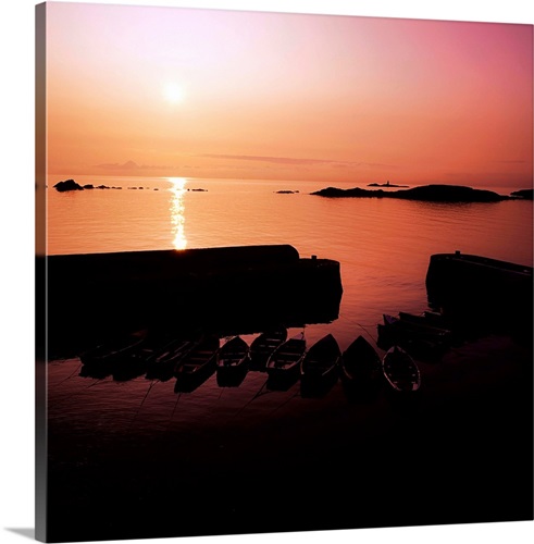 coliemore harbour co dublin ireland sunrise over a harbour wall
