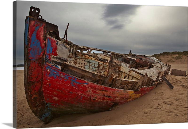 Colorful Weathered Shipwreck Lying In Sand Dunes At Crow Point, Devon ...