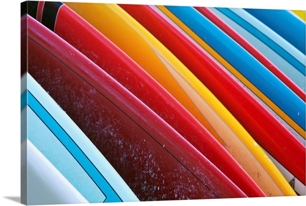 Coloured surfboards lined up, Honolulu, Oahu, Hawaii