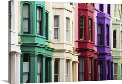 Colourful residential buildings in a row, Notting Hill, London, England