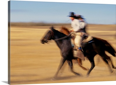 Cowboys Racing Horses
