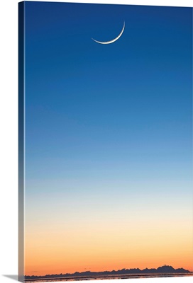 Cresent Moon Rising At Sunset Over Cook Inlet, Anchorage, Southcentral Alaska