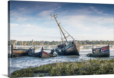 Derelict Boats Rot On The Mud At Pin Mill