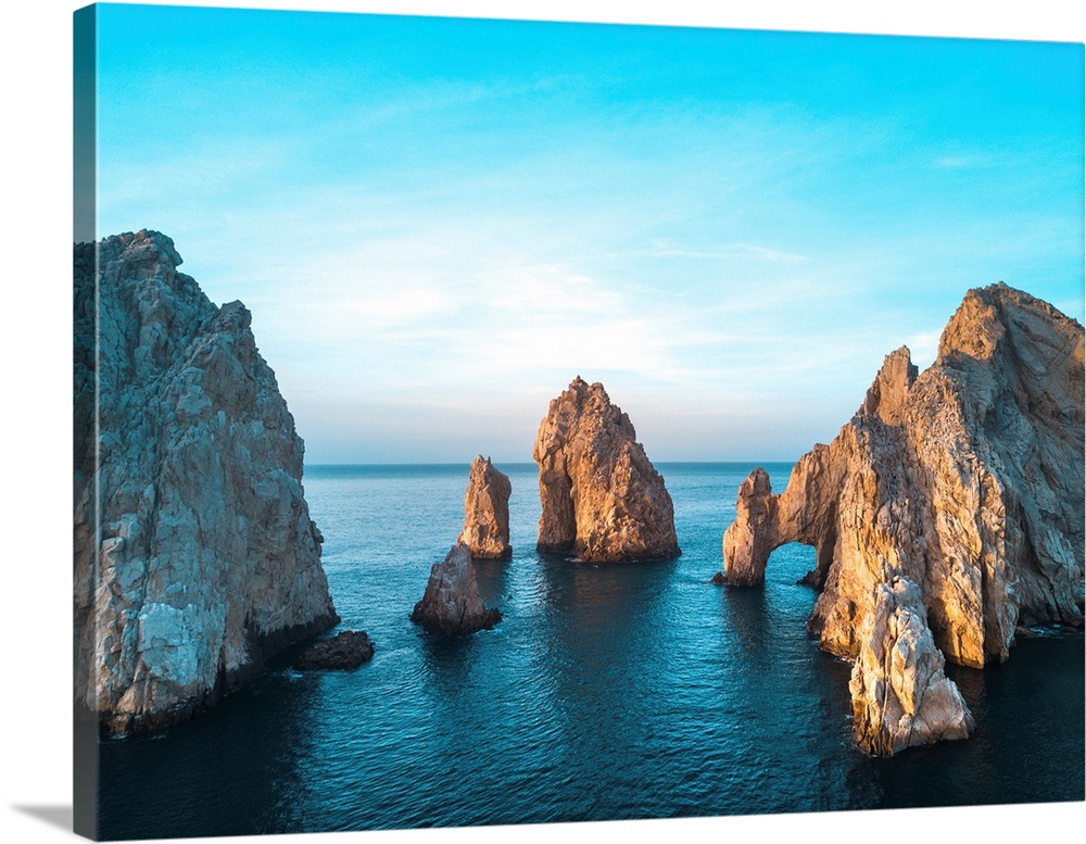 Dramatic rock formations and Arcos de Cabo San Lucas (Arch of Cabo San Lucas) on the coast at Lands End at sunset, Cabo Sa...
