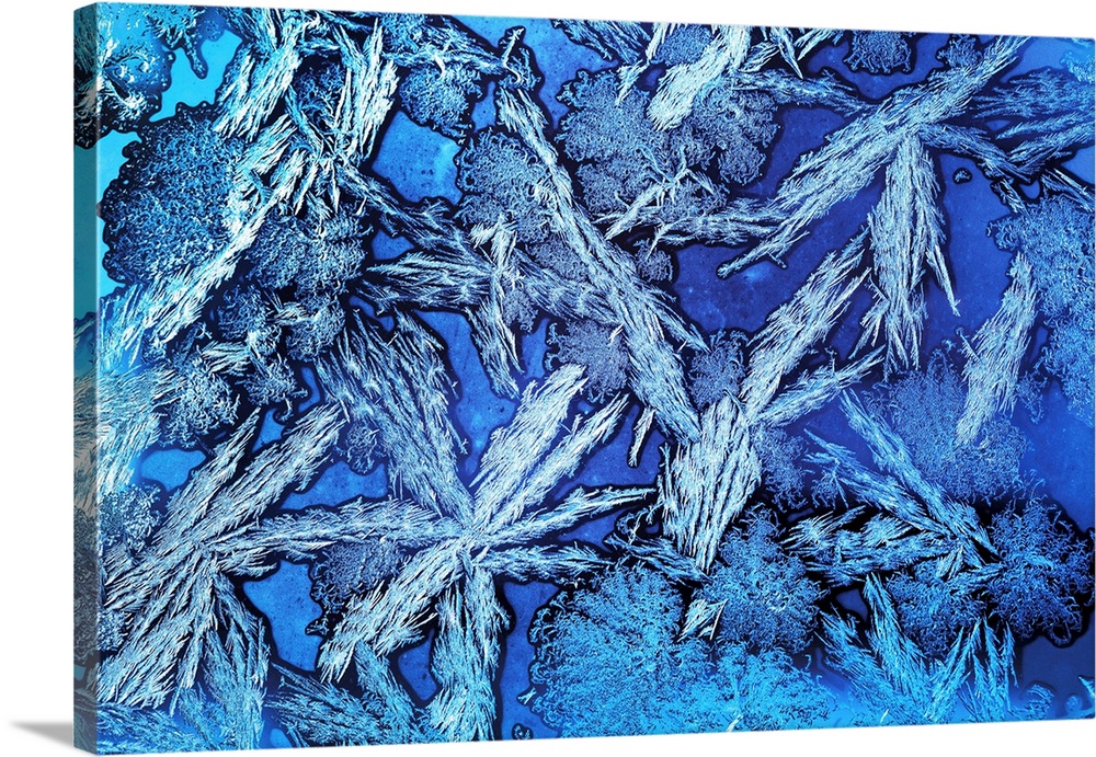 Extreme close-up of frost crystals patterns on glass, Calgary, Alberta, Canada.