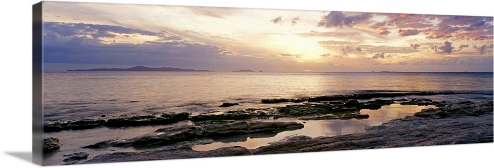 Fiji, Sunrise Over Ocean And Rocky Coastline