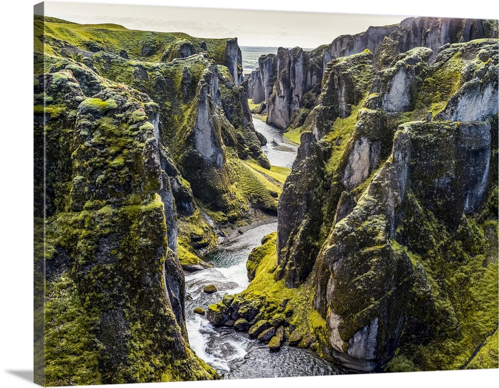 Fjadrargljufur is a magnificent and massive canyon, about 100 meters deep and about two kilometres long. The canyon has sh...