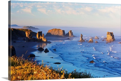 Fog Covers Rock Formations Along The Coast At Bandon State Park; Oregon, USA