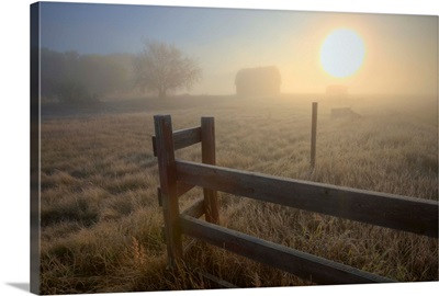 Foggy Sunrise Over Abandoned Farm With Fence And Barn, Alberta Prairie, Canada