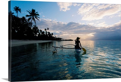 French Polynesia, Moorea, Woman Paddling In Outrigger Canoe Along Shoreline