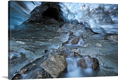 Glacial Creek Flowing From Blue Ice Cave In Britnell Glacier, Canada
