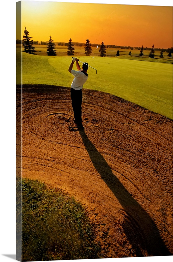 Golfer Taking A Swing From A Golf Bunker