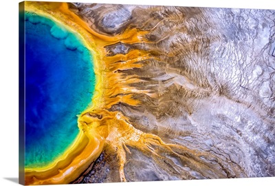 Grand Prismatic Spring is one of the largest and most beautiful examples of a common hydrothermal feature in Yellowstone National Park and one of the largest hot springs in the United States.