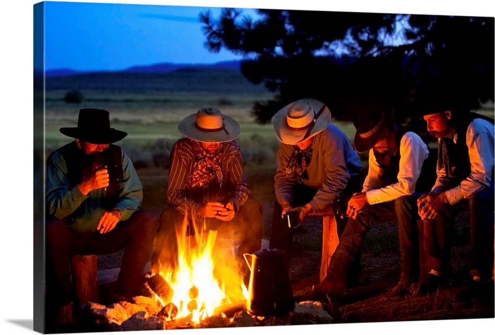 Group Of Cowboys Around A Campfire