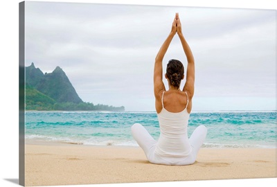 Hawaii, Kauai, Haena Beach, Woman Meditating On Sandy Shore