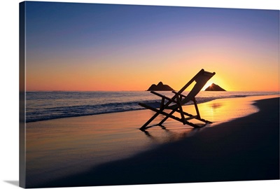 Hawaii, Lanikai, Empty beach chair at sunset