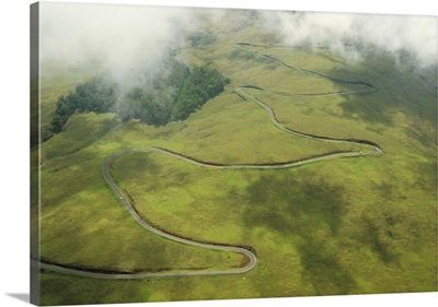 Hawaii, Maui, Haleakala Crater, Aerial View Of A Road Winding Up A Hill