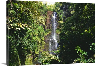 Hawaii, Maui, Hana Coast, Waterfall Surrounded By Lush Greenery