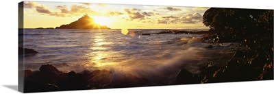 Hawaii, Maui, Hana, View Of Sunrise Bursting Over Alau Island From Hana Shoreline