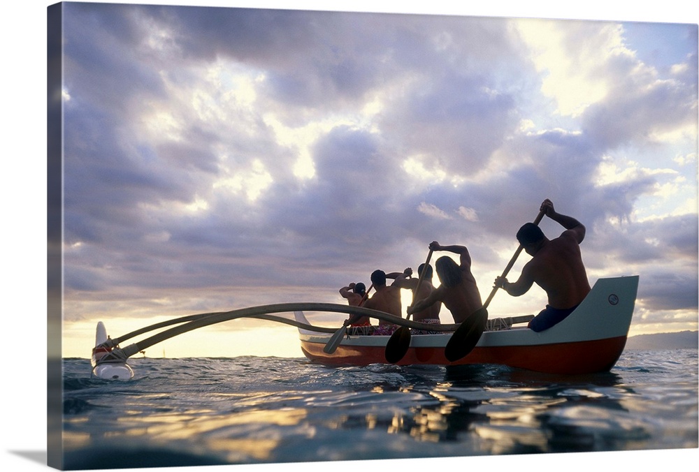 Hawaii, Men On Outrigger Canoe Paddle Into Sunset Under Dramatic Clouds