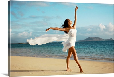 Hawaii, Oahu, Lanikai Beach, Ballet Dancer On Beach Wearing White Flowing Fabric