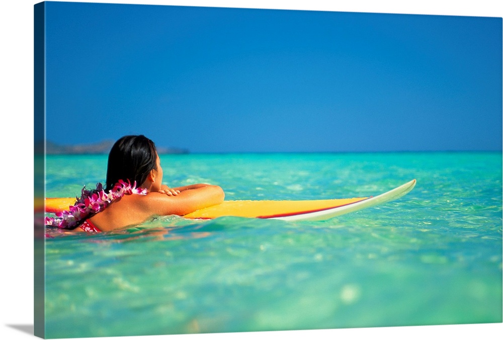 Hawaii, Oahu, Lanikai, Woman Resting On Surfboard Looking Out On Clear Teal Water