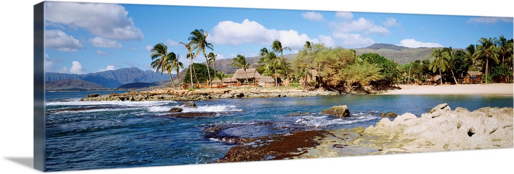 Hawaii, Oahu, Paradise Cove, Thatched Huts Along Shoreline