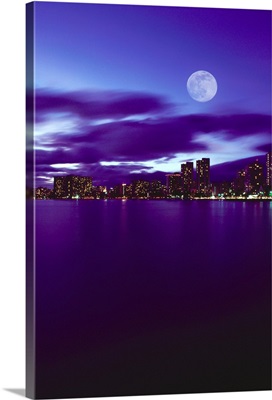 Hawaii, Oahu, Waikiki City Lights With Large Full Moon, Reflections On Water
