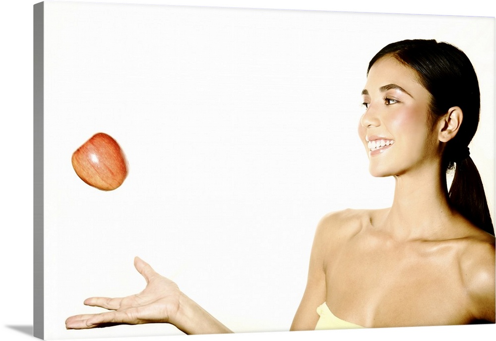 Hawaii, Studio Headshot Of A Beautiful Girl Holding An Apple.