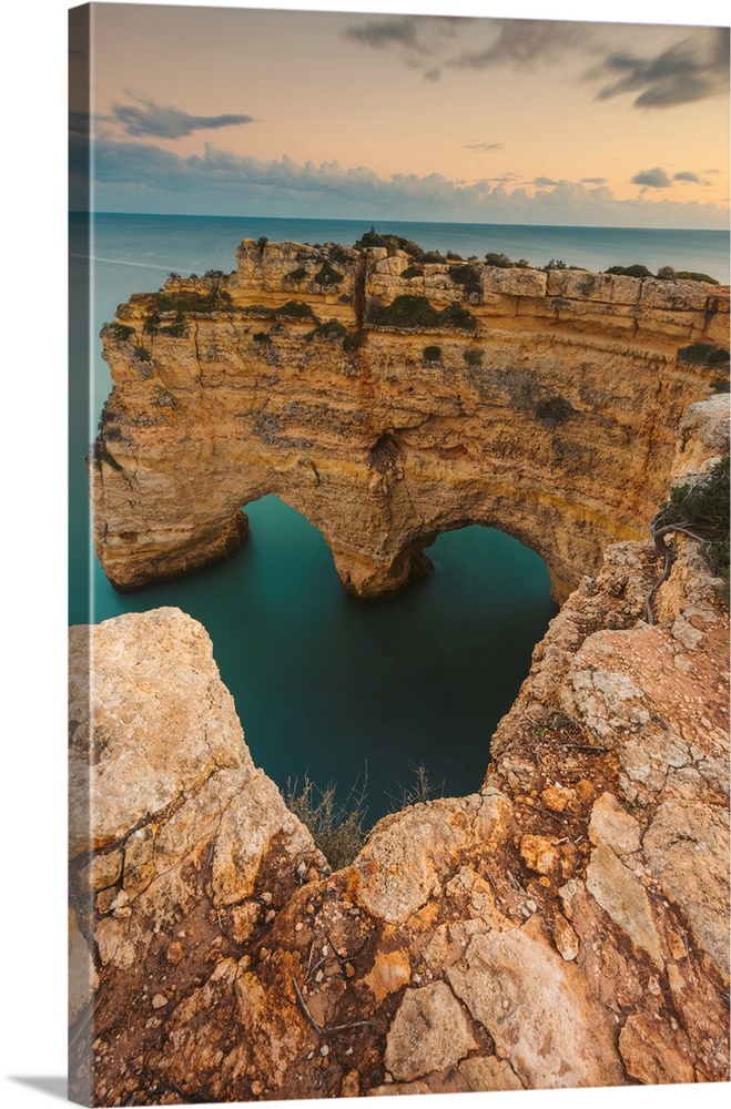 Iconic rock formation, Arcos Naturais, Heart of the Algarve, and the turquoise water of the Atlantic Ocean at Praia da Mar...