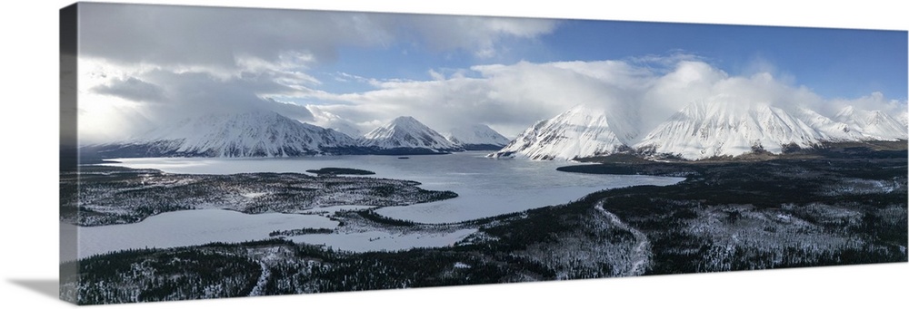 Aerial view of Kathleen Lake with Kings Throne and Mount Worthington looming beside it on a beautiful late winter day; Hai...