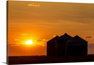 Large Metal Grain Bins At Sunrise, Alberta, Canada