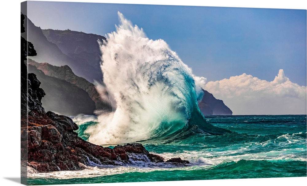 Large waves crashing along the rugged coastline of the Na Pali coast at Ke'e beach, Kauai, Hawaii, united states of America.