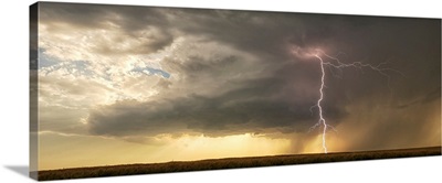 Lightning Strikes From A Supercell Thunderstorm Over A Wheat Field In Nebraska