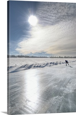 Lone Speed Skater On Sylvan Lake, Alberta, Canada