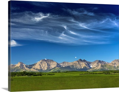 Mountain Range With Wispy White Clouds, North Of Waterton, Alberta, Canada