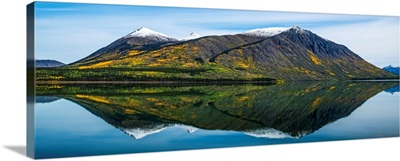 Mountains surrounding Carcross reflected in the still waters, Yukon, Canada