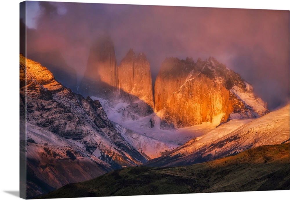 The mountains surrounding and within the Torres del Paine National Park in Southern Chile, taken here at sunrise; Torres d...