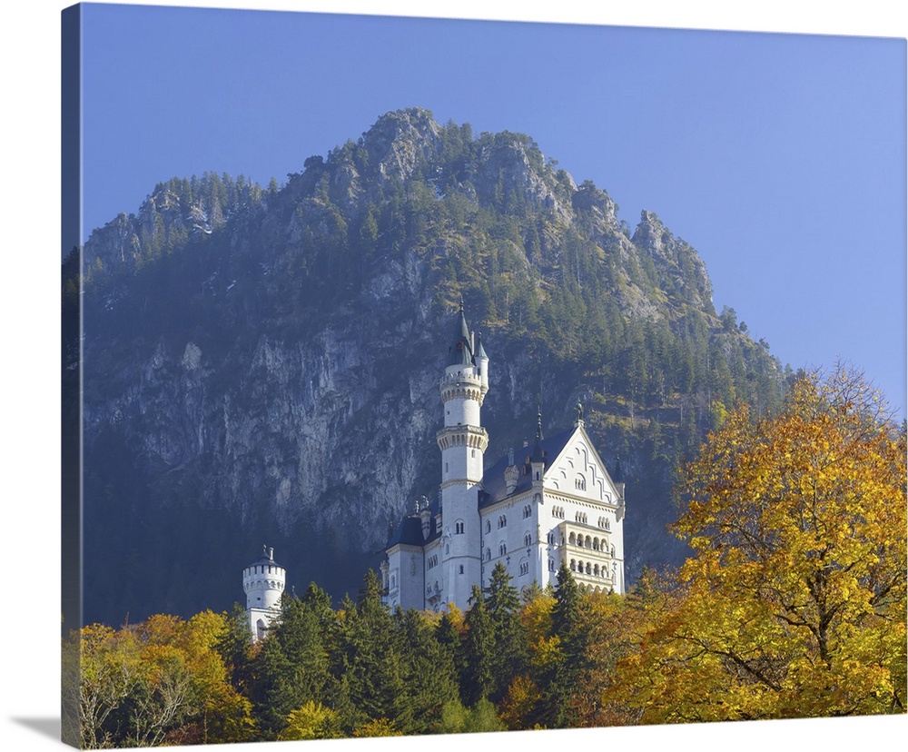 Neuschwanstein Castle above the village of Hohenschwangau in autumn, Bavaria, Germany