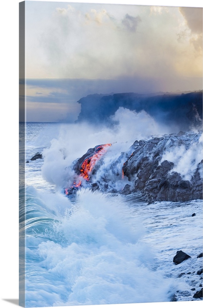 Pahoehoe lava flowing from Kilauea has reached the Pacific ocean near Kalapana; Island of Hawaii, Hawaii, United States of...