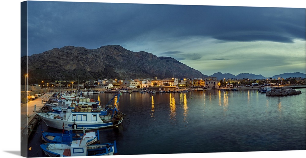 Panoramic view of the harbour at twilight.