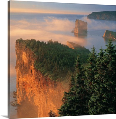 Perce Rock And The Three Sisters In Fog At Sunrise, Gaspe Peninsula, Quebec, Canada