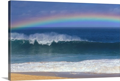Rainbow Over Shore Break Beach Foreground, Horizon And Blue Sky