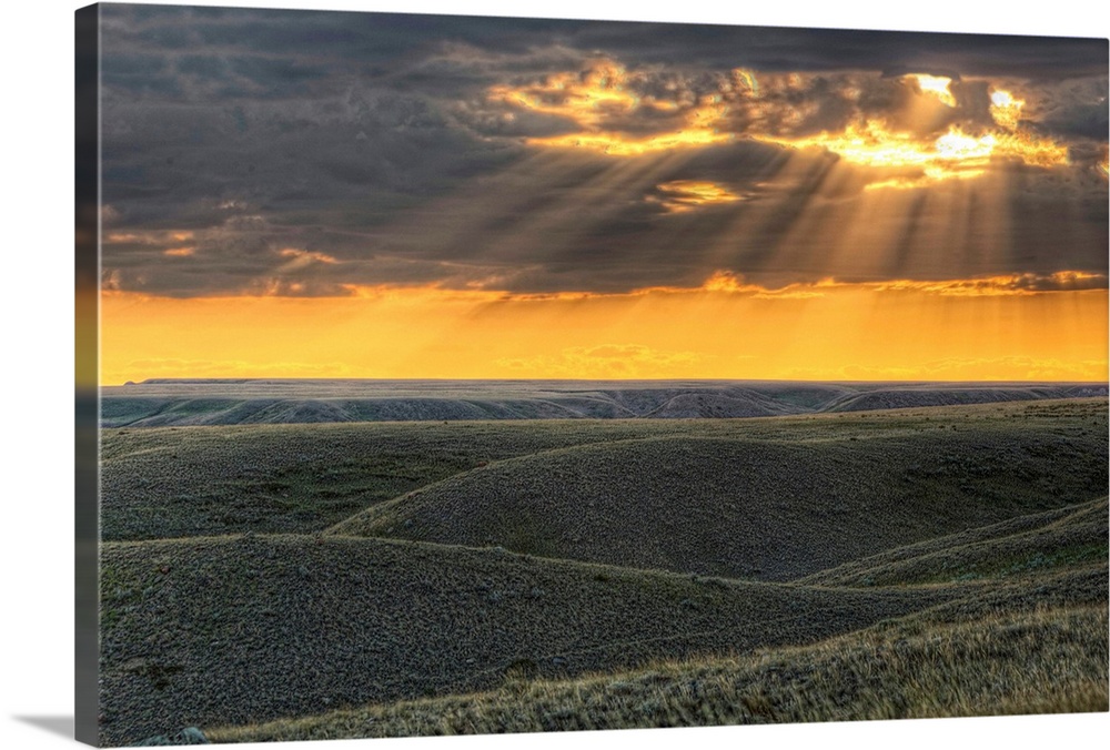 Rays Of Sunset Light Between The Clouds, Saskatchewan, Canada