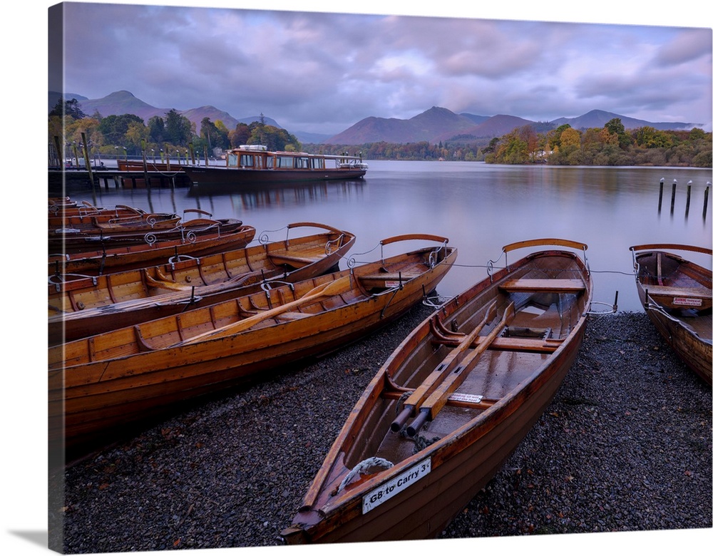 Rowing boats on the shore of Derwent Water at Keswick in the English Lake District.