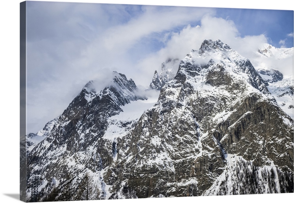 Rugged peaks of snow-covered mountains, Italian side of Mont Blanc; Courmayeur, Valle D'Aosta, Italy.