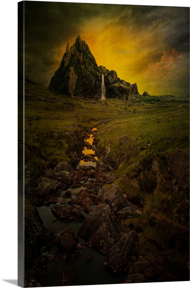 Rugged rock formation with peaks against a dramatic glowing sky, a composite image; Dingle, County Kerry, Ireland